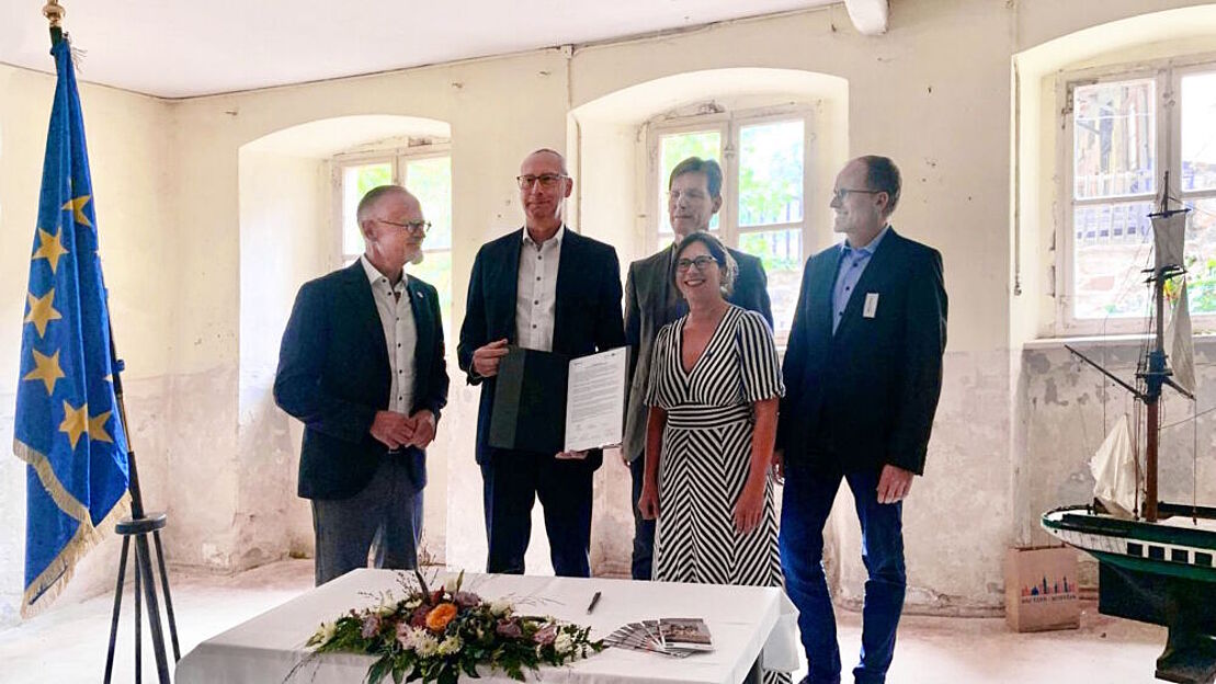 Zum Beitrag über internationales Symposium