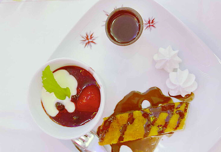 Aufsicht auf ein Menü des Welterbedinners